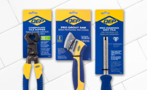 QEP Compound Tile Nipper, Pro Grout Saw & Pro Diamond Grit File packaging & tools on white tile background